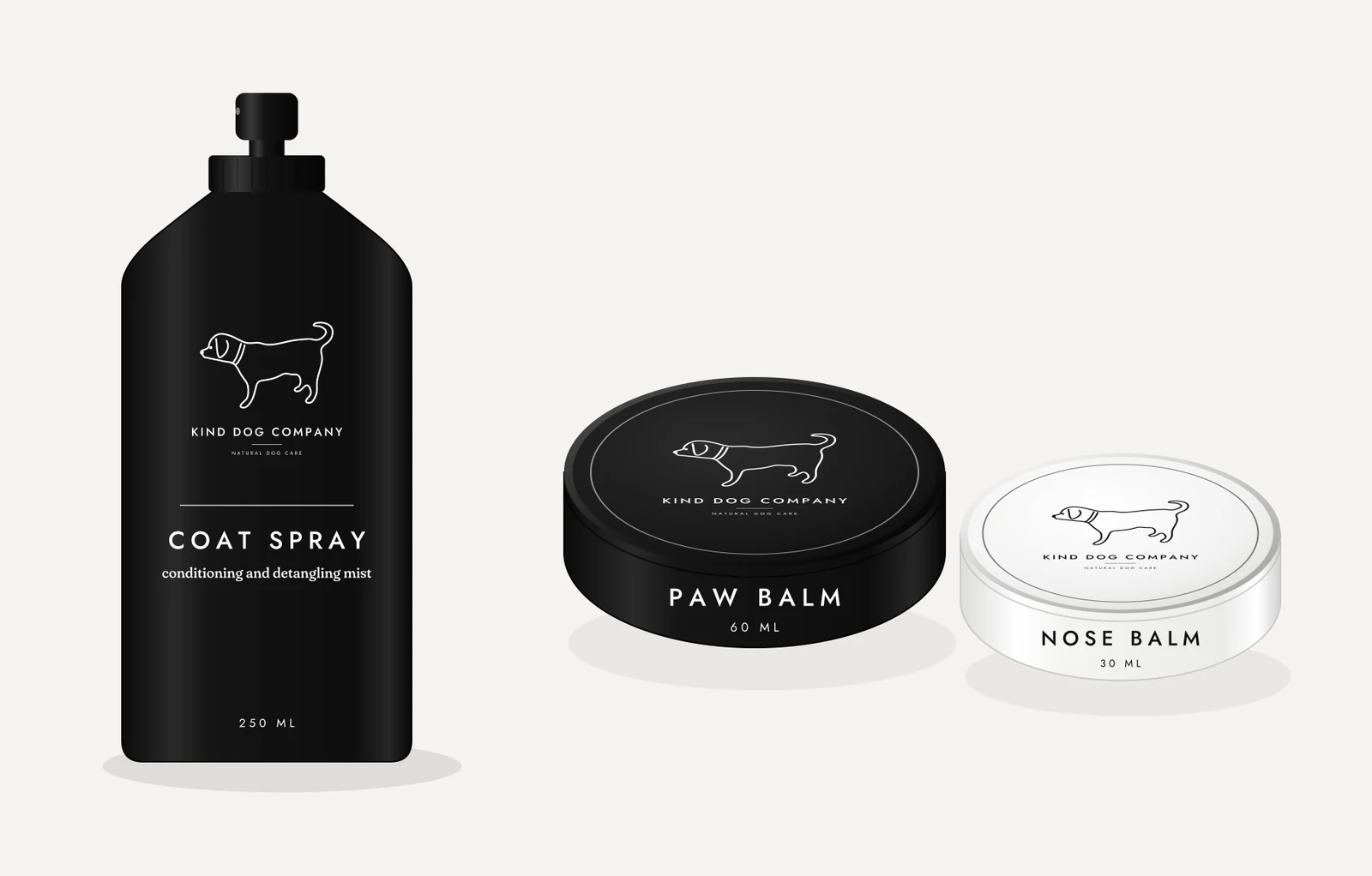 Kind Dog Company coat spray in a black bottle with paw balm and nose balm tins